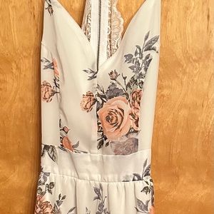 Floor length floral print dress.